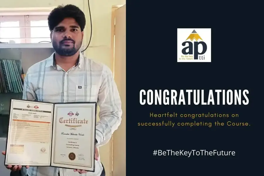 An APTTI graduate holding her certificate